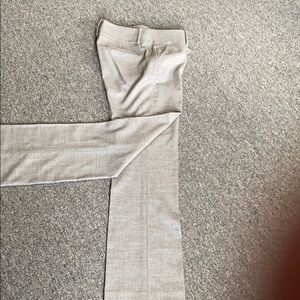 Grey light wool slacks.